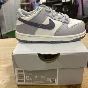 Gray and white low cut dunk